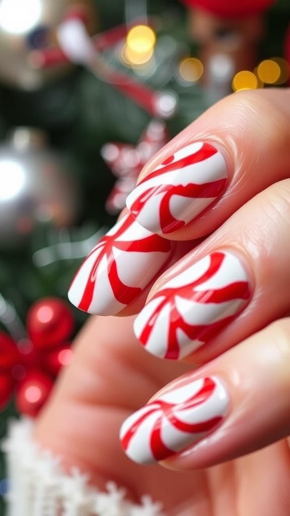 Close-up of peppermint-themed Christmas nail art with red and white stripes.